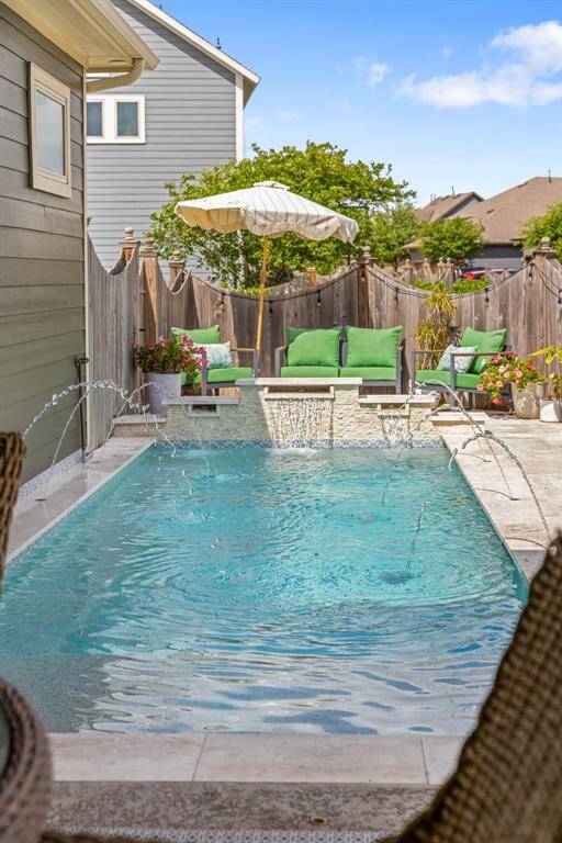 The pool also features a sprinkler system enhancing the outdoor area’s lushness and maximum fun potential.