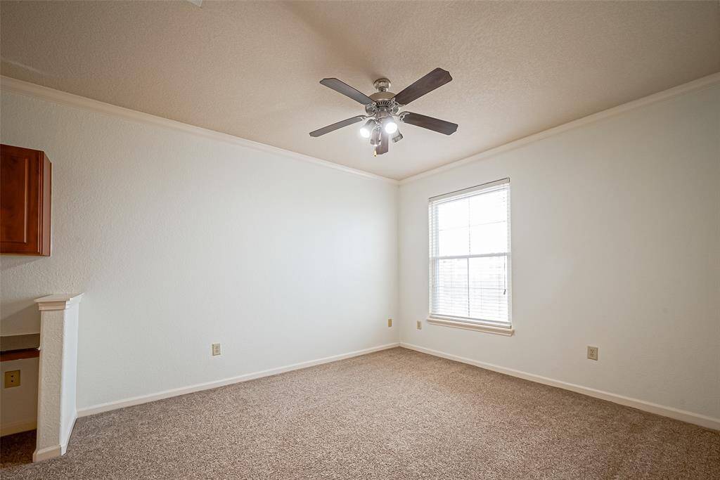 The carpeted floor adds comfort in both bedrooms.