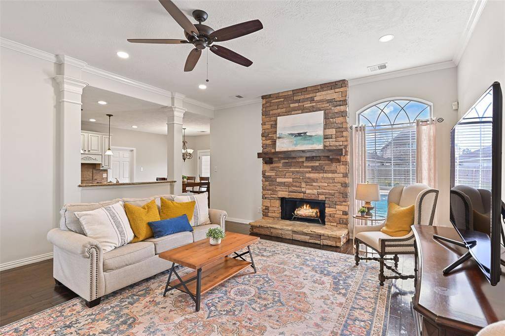 From this vantage point, note the raised dining or serving area that opens into the adjoining kitchen.