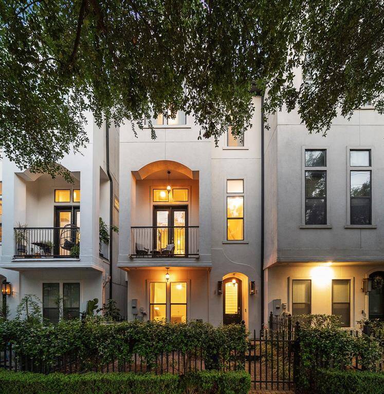Set behind lush greenery on a tree-lined Heights street, 1721 Ashland Street glows with warmth at golden hour. Thoughtfully designed to maximize privacy and natural light, the east-west orientation captures soft morning light and glowing sunsets from both the balcony and patio. Enjoy gated front yard living just steps from trails, top dining, and beloved neighborhood hangouts.