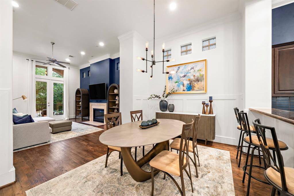 Positioned between the kitchen and living room, the dining area enhances the home’s natural flow—perfect for weeknight meals or gathering with friends before heading out on foot to nearby spots.