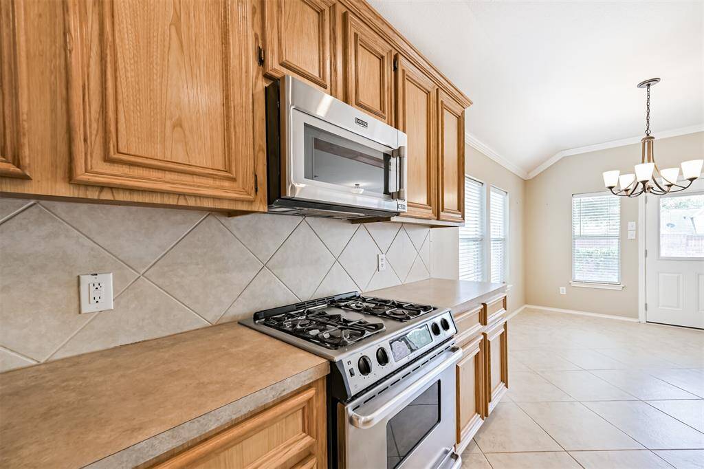 Gas stainless steel range with overhead built in microwave