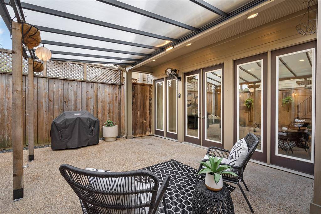 [Backyard] Fully fenced backyard with covered pergola, low maintenance landscaping and automated irrigation system