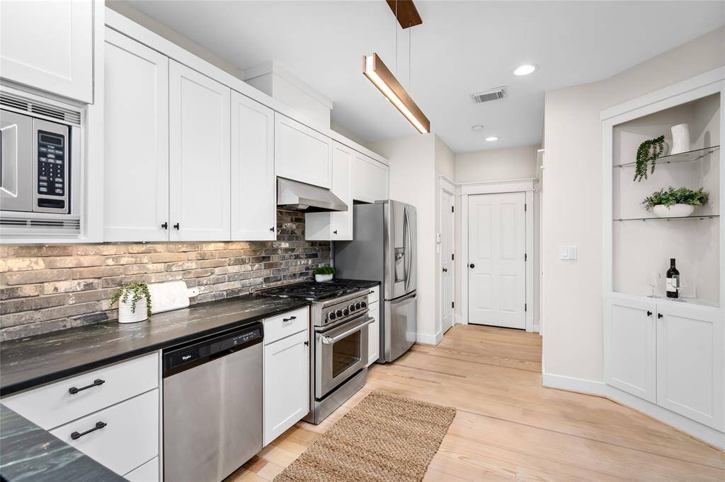 [Kitchen] Smartly designed, walk in from your garage with your groceries, large pantry located behind door on left