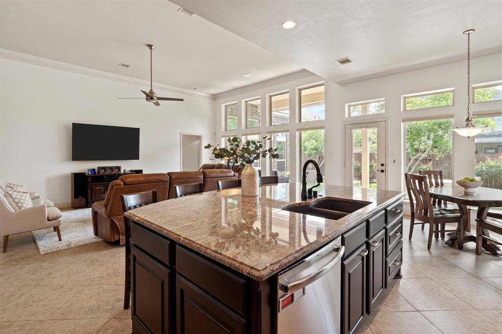 With direct sightlines to the family room and backyard, this kitchen is truly the center of the home, offering form, function, and connection.