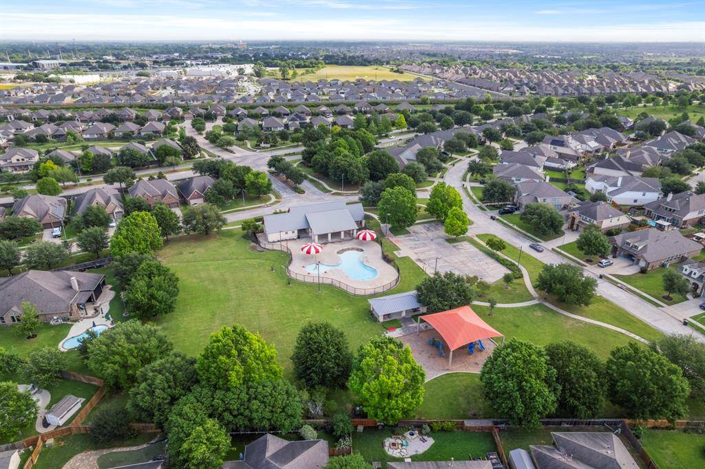 Just a short walk from your doorstep, enjoy this private neighborhood retreat featuring a sparkling splash pad pool, shaded playground, and open green space—perfect for summer fun and family outings.
