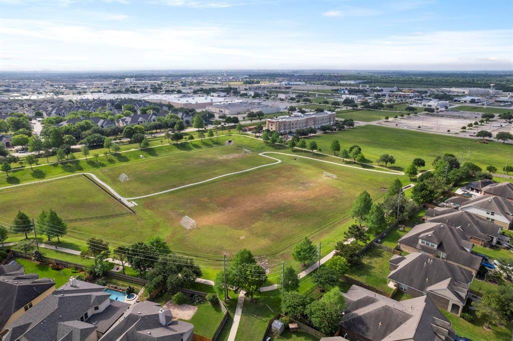 Stay active with easy access to well-maintained soccer fields and walking trails that surround the nearby commercial area, offering convenience and recreation in one central location.
