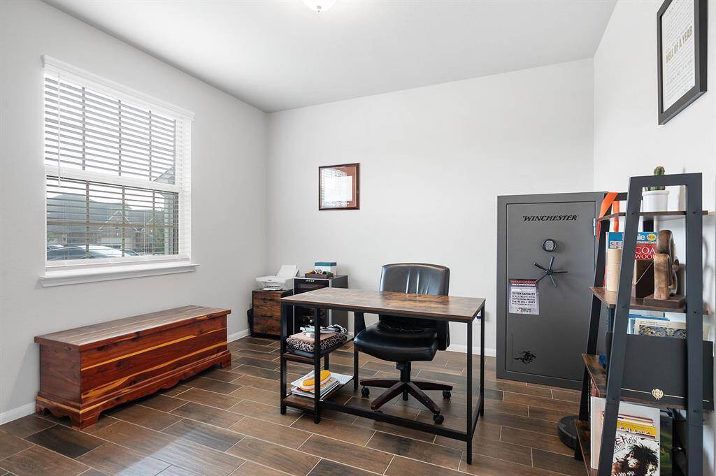 Large home office with lots of natural light