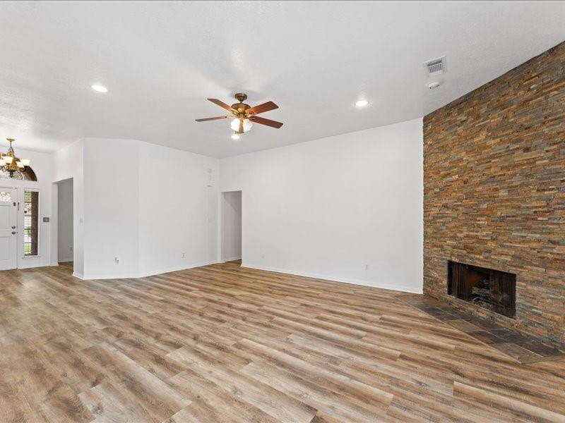 Stylish Stone Fireplace with Gas Buring Logs