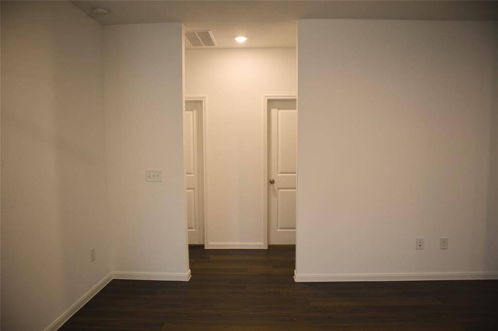 The secondary bedrooms are off the den area.