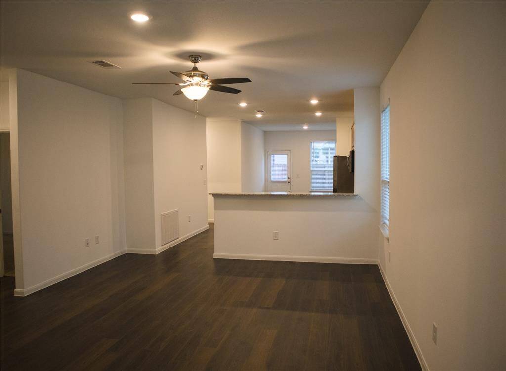 As you enter the home you will notice the neutral paint, pretty floors and open concept.