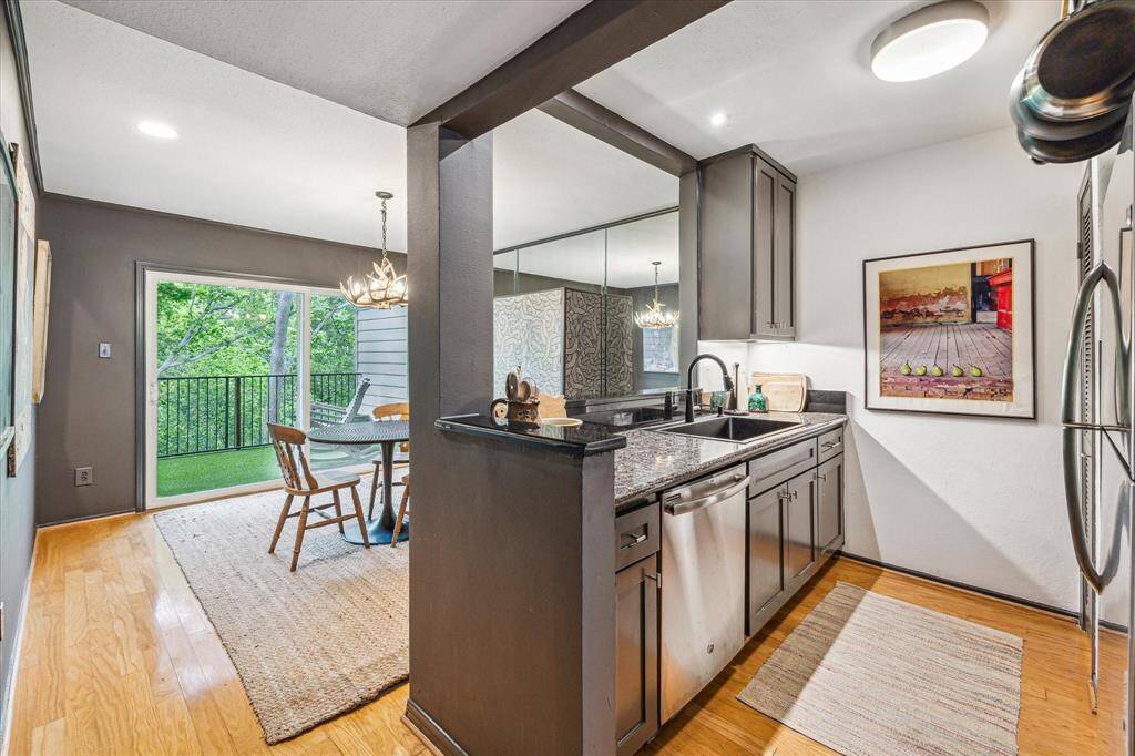 The chic black paint continues from the kitchen into the dining room. The kitchen and dining room have an easy flow!
