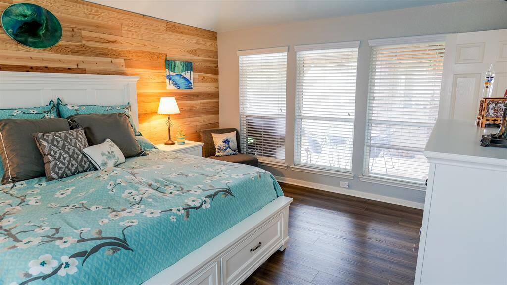 The window wall looks out to the patio.