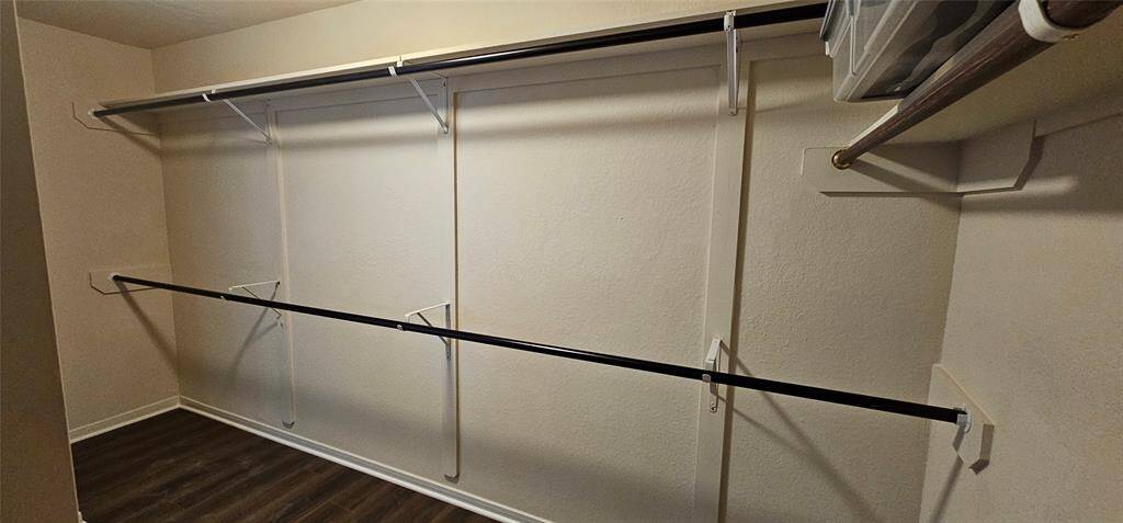 The closet in the primary suite is LARGE. It was recently remodeled to have 2 hanging rods on the backwall. There also is a built in shelf.