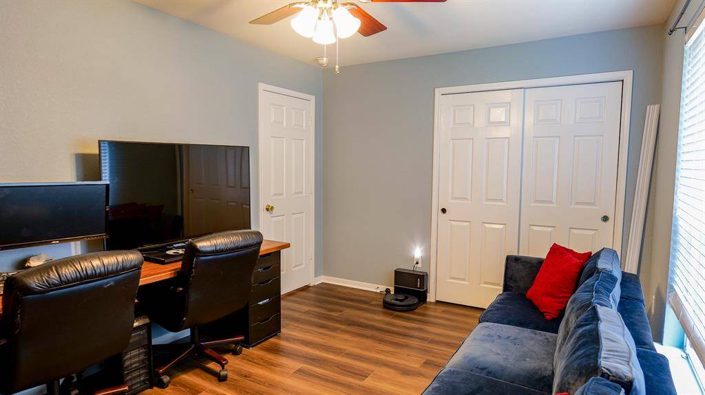 This room has a wall of closets as well as a ceiling fan. ALL of the bedrooms have ceiling fans.