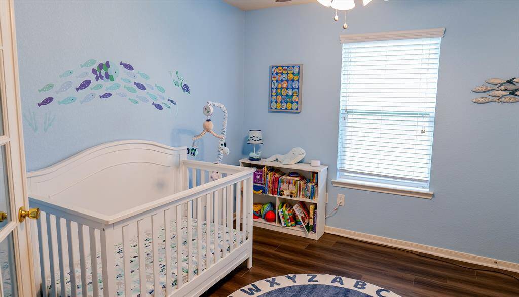 There is a walk-in closet in this bedroom/office room.