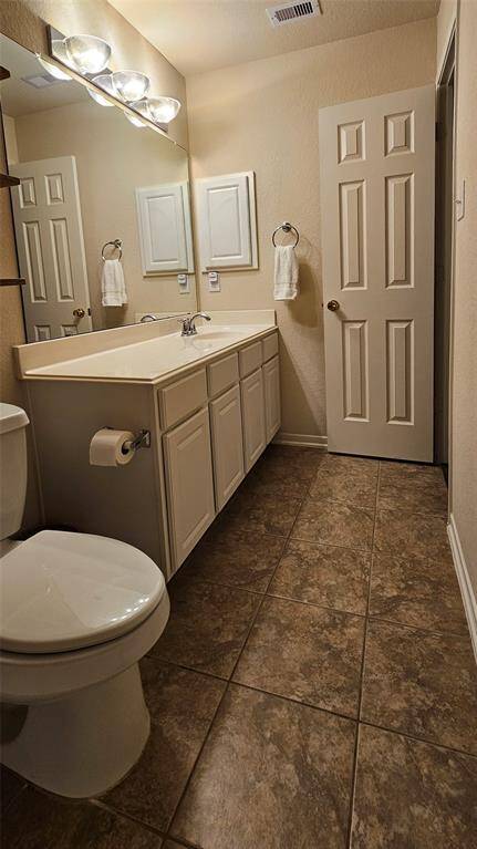 This bathroom has an extended countertop allowing for extra space.