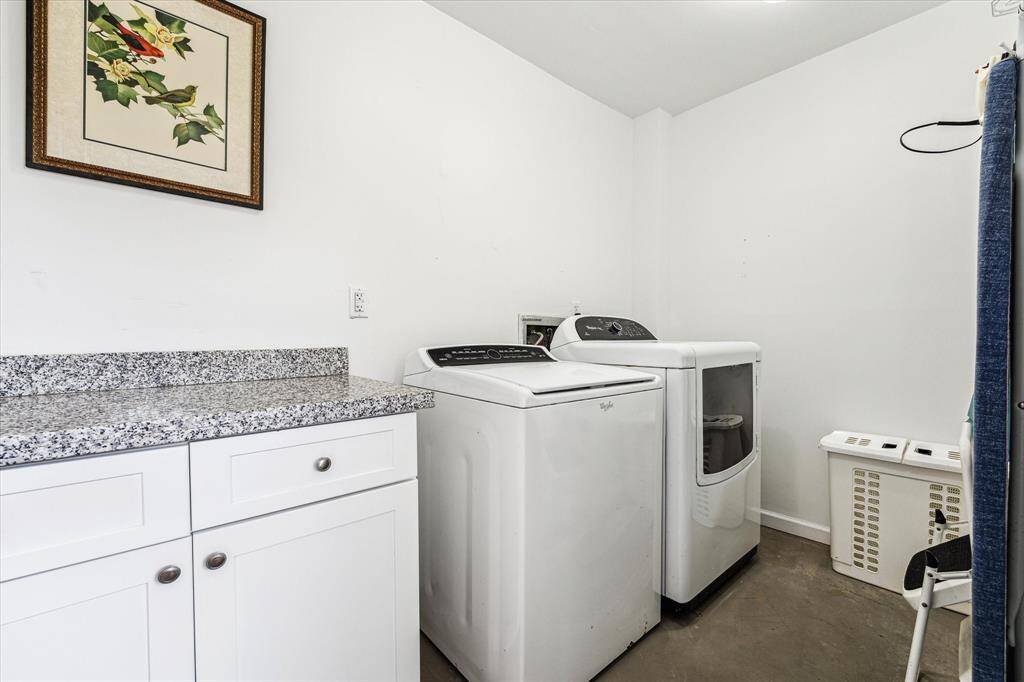 Private Utility Room off private patio.