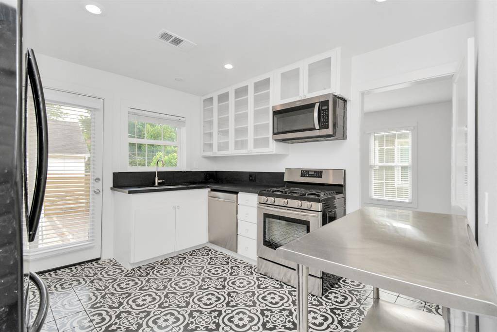 Welcome to 1909 Banks! This rental has a large, fenced front yard and plenty of street parking.