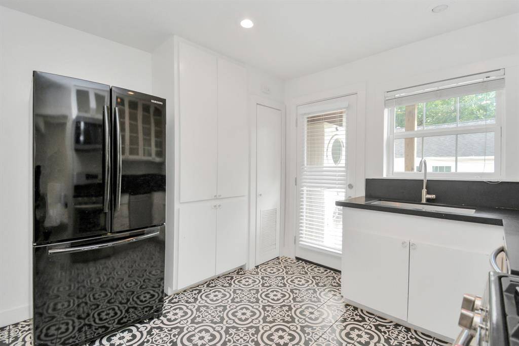 Large pantry next to the Samsung refrigerator