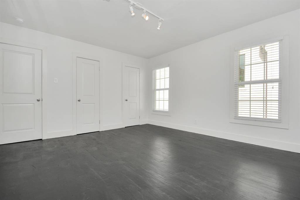 Back bedroom with 2 closets and beautiful built-in cabinets