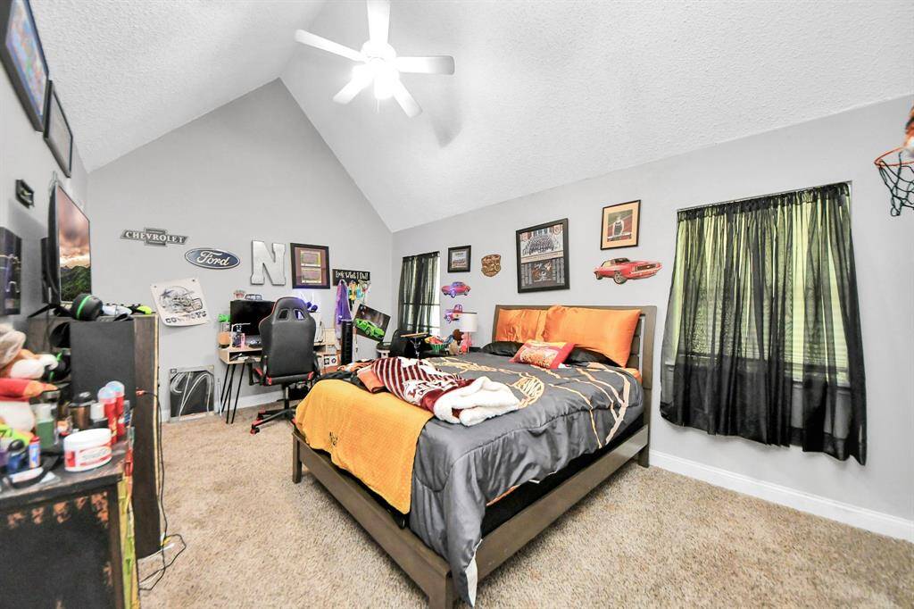Second secondary bedroom with two large closets, offering ample storage and space.