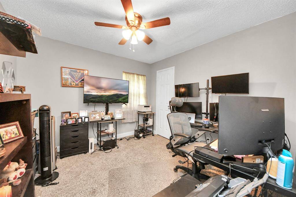 Third secondary bedroom, currently used as an office, offering versatile space for your needs.