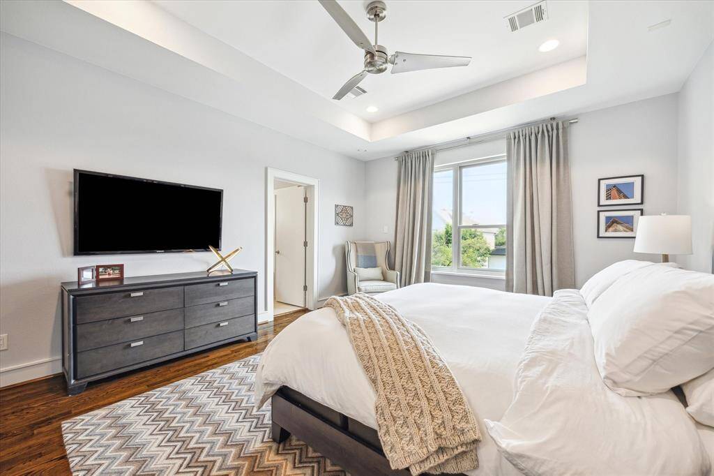 Another view of the primary bedroom.