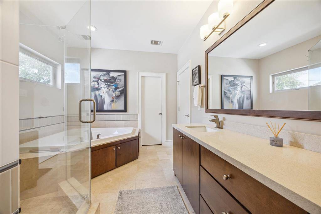 Double sinks in the primary bath as well as an abundance of counter space and storage.