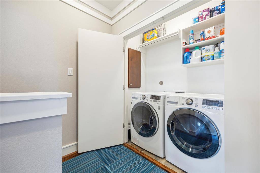 Laundry room. Owner is leaving the washer and dryer.