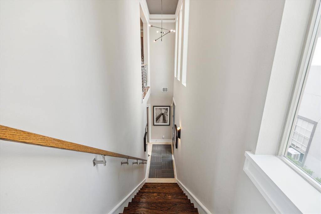 Dramatic two story entryway and designer lighting.
