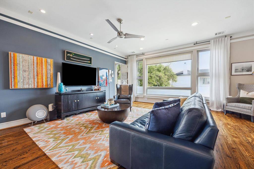 Wonderful family room with ornate crown moldings and oversized windows. All the front windows have been replaced as well as stucco work, so no need to worry about the stucco, owner has already addressed any issues that have come up.