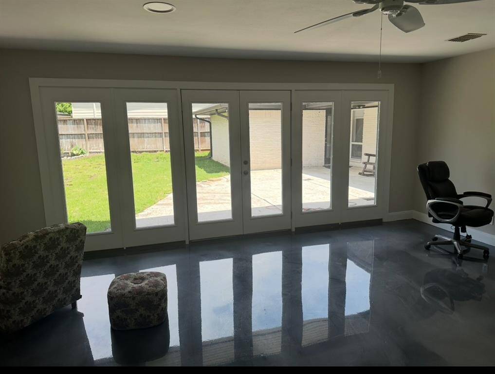 Great space for the kids in the bonus room with doors to the back yard