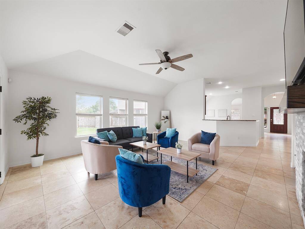 bar seating perfectly brings the family and kitchen area together for entertainment