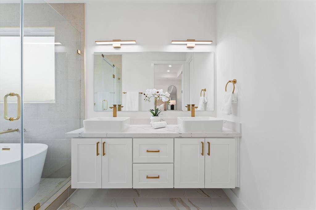 Actual bathroom is much wider and bigger in person. This photo is wide lense to show details of primary bathroom set up, making it appear smaller than it is. See it in person today!
