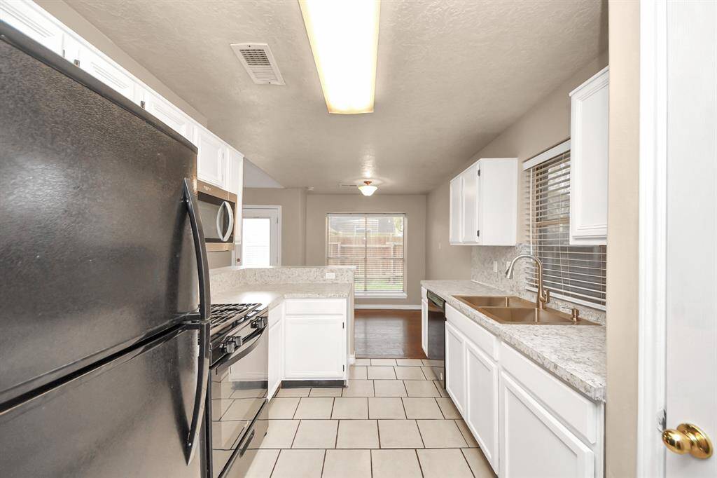 The heart of the home, this kitchen offers both elegance and practicality for everyday use.