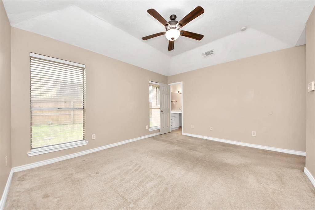 An inviting retreat where high ceilings and ample space create a sense of tranquility.