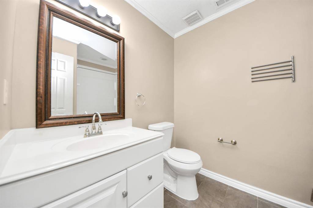 A stylish and functional bathroom, designed to offer comfort and convenience.