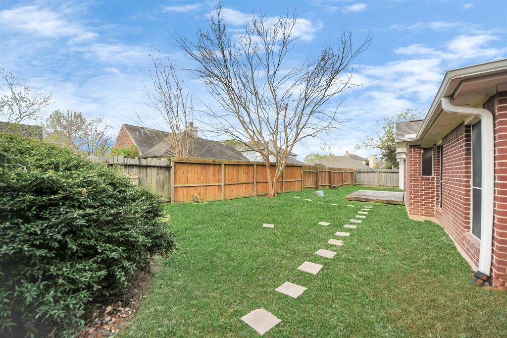 A thoughtfully designed backyard that invites you to relax and enjoy nature.