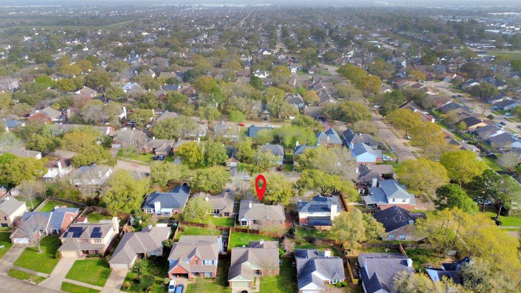 Aerial view of the home and neighborhood.