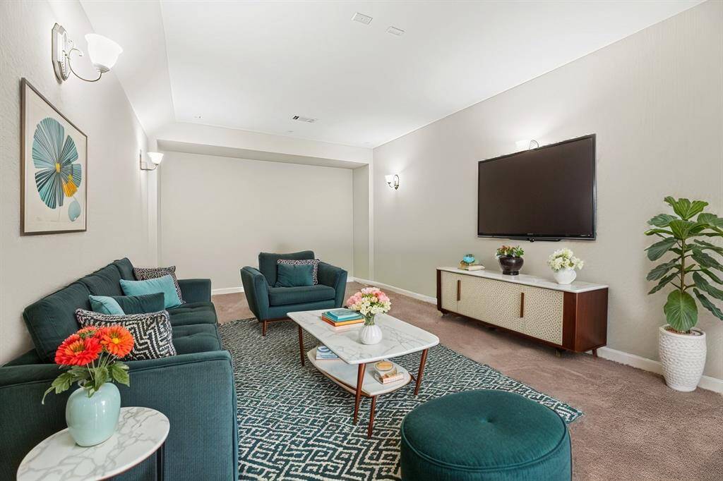 Off the game room is a media room. This upstairs is all about family fun and entertainment and nothing says Don't Forget the Popcorn like a dedicated media room!  It's all here.