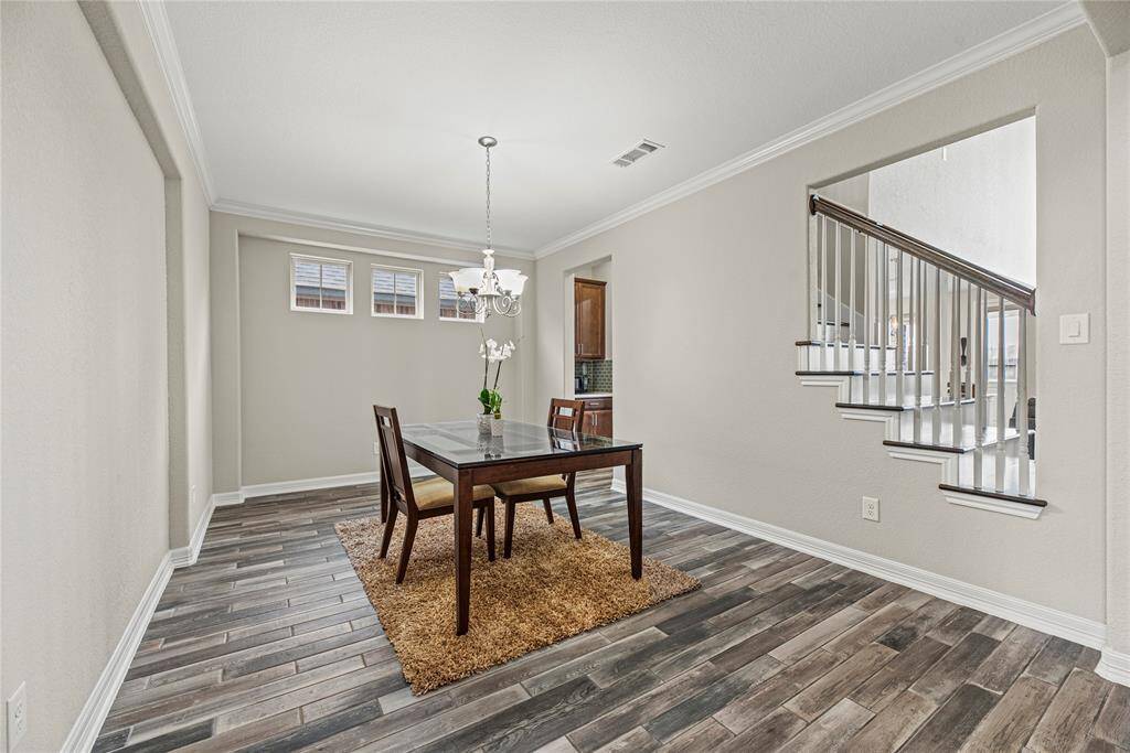 Further into the floorplan is your Formal Dining Space. This is a perfect space for those special gatherings. Offering direct access to the kitchen and butler's pantry.