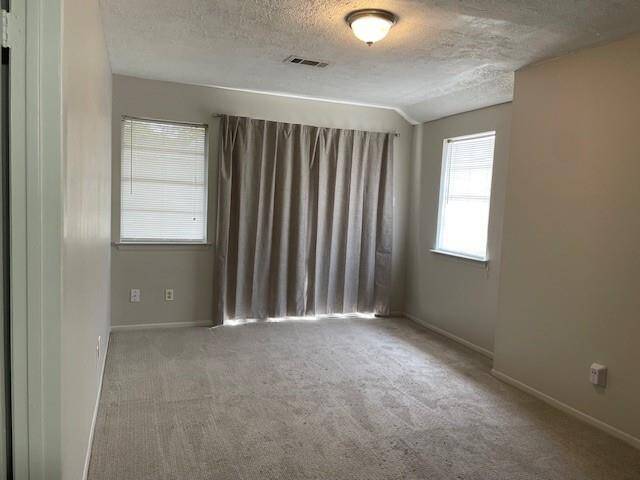 Secondary bedroom with balcony