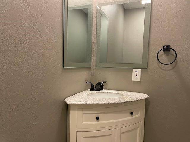 Powder room off dining area