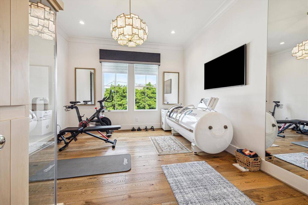 This secondary bedroom with en-suite is currently being used as an exercise room.  You can re-imagine the space to fit your needs.