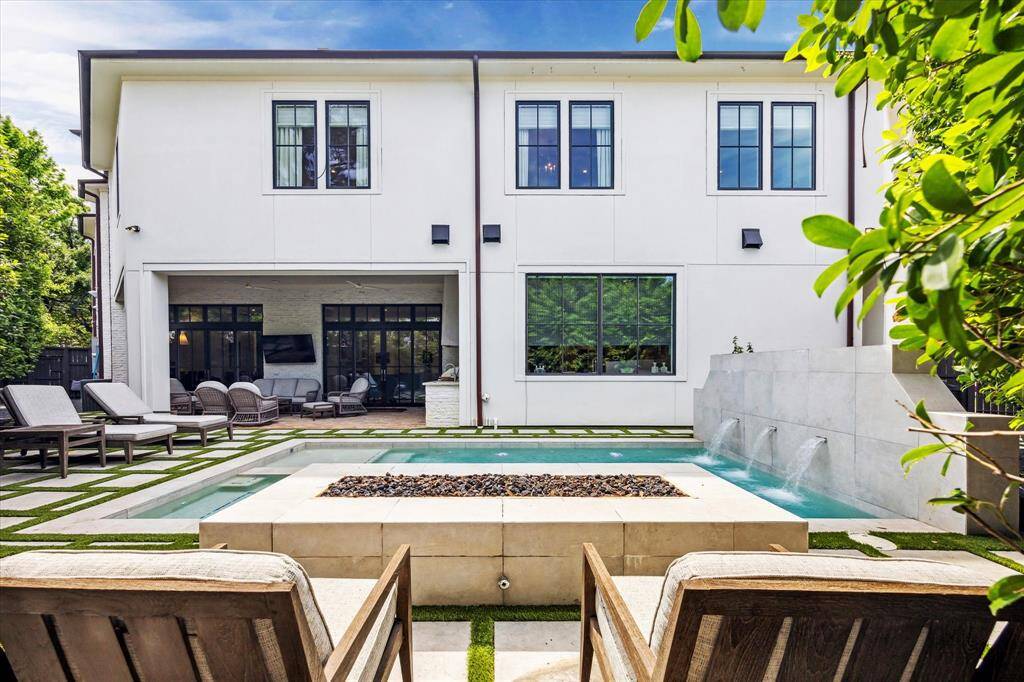 The back elevation of the home offers a restful view with its clean lines and finishes.