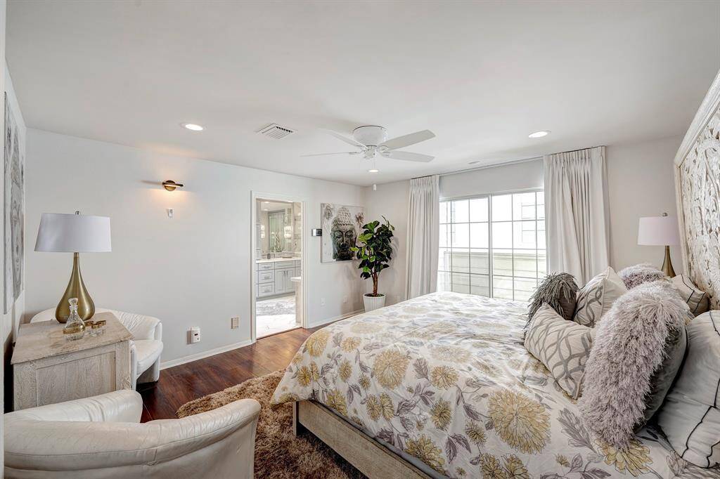 Upstairs primary has ceiling fan and recessed lights. soft drapes. A zen escape.