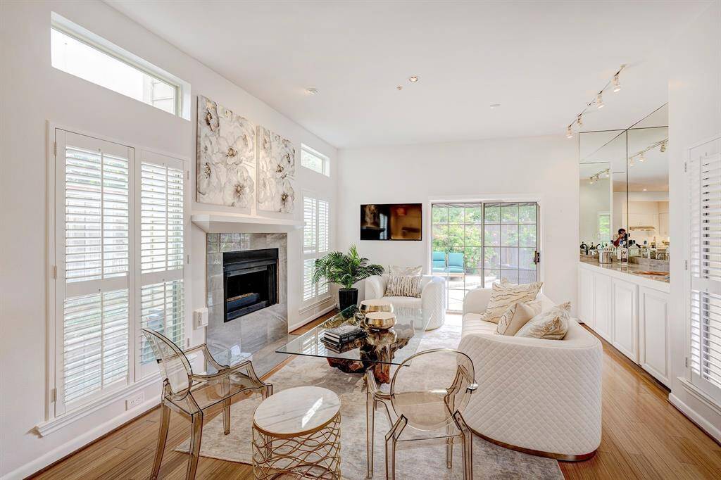 Dining Room, Kitchen and Living room can see the outdoor view , (and TV) and Pool. Bar area to the right. Storage underneath convenient for Happy Hour at the Pool.