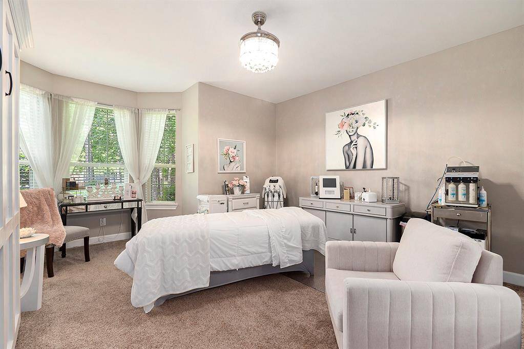 Third bedroom with beautiful front yard view