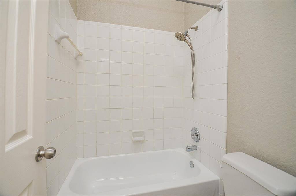 There's just something so relaxing about a white bathroom --- or kitchen! This full bath hosts combined shower/bathtub for comfortable personal options.